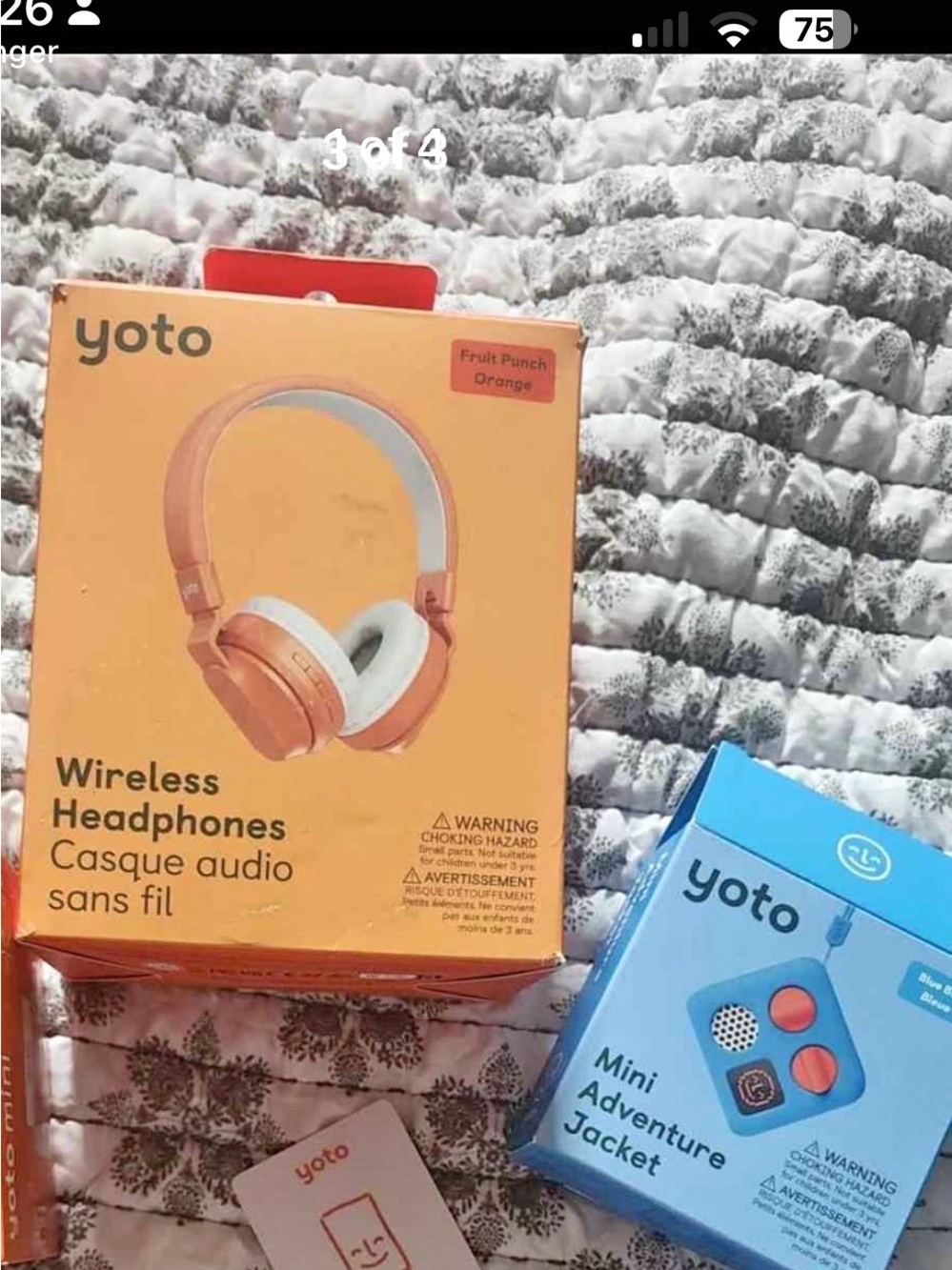 Yoto wireless headphones and a jacket case